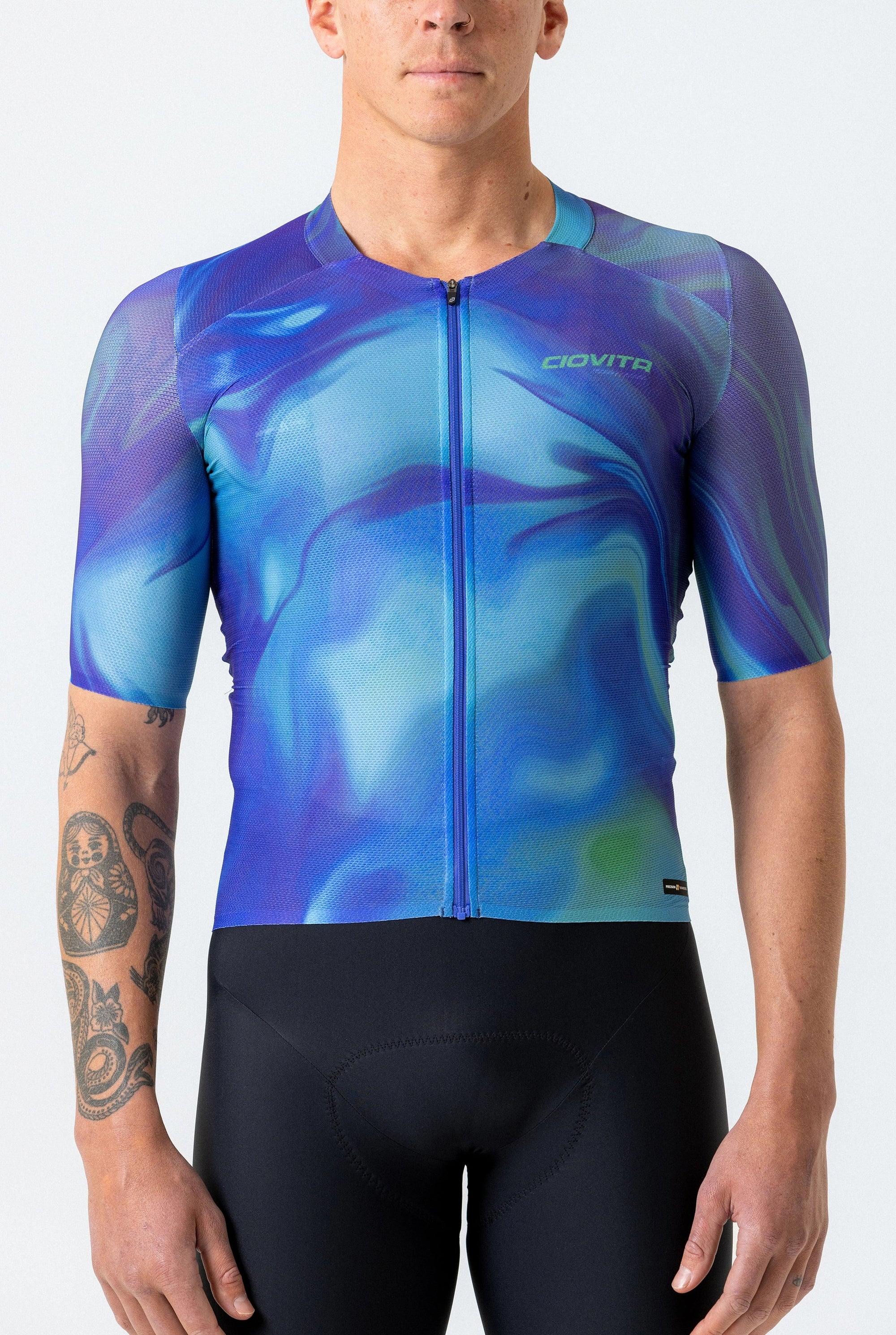Cycling jersey with a blue and purple abstract design on a white background